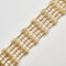 Bracelet Bracelet manchette à décor ajouré or jaune 58 Facettes