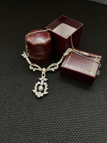 Collier Collier Art Nouveau en or blanc 18k et diamants 58 Facettes