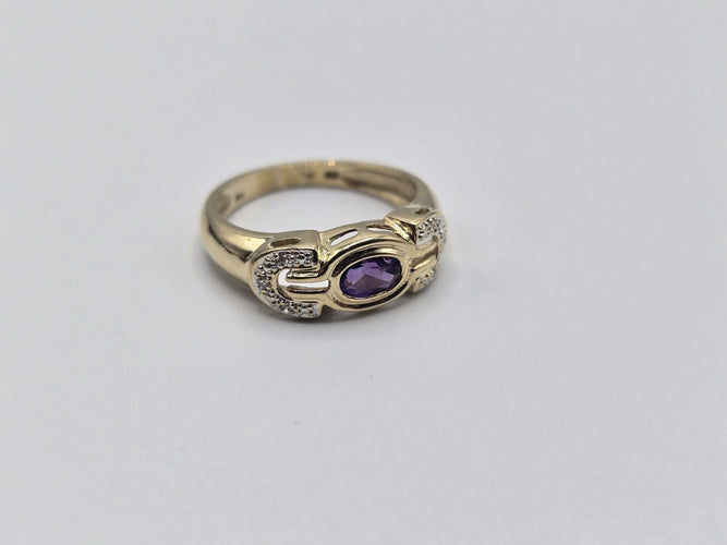 Bague 54 Bague OR Jaune 14k sertie d'une tourmaline au centre et d'éclats de diamants sur les côtés 58 Facettes 1-0000437/5