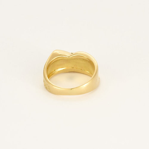 Bague en or jaune à motif de noeud stylisée
