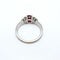 Bague Bague en or blanc de style vintage avec tourmaline ovale et péridots. 58 Facettes 50346