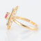 Bague 50 Bague or jaune, rubis, motifs "arabesques" 58 Facettes