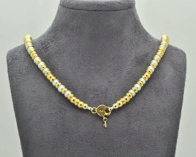 Collier Collier vintage en or et perles 58 Facettes 8498