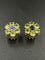Boucles d'oreilles PASCALE BRUNI. Boucles d’oreilles or, tanzanites et péridots 58 Facettes