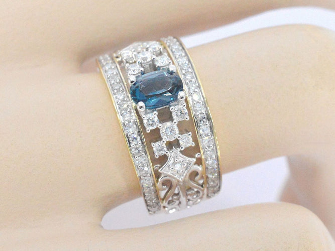 Bague 54 Bague exclusive en or sertie de diamants et d'une pierre précieuse 58 Facettes 2329