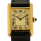 CARTIER - Montre Tank Must en argent plaqué or, cadran blanc chiffres romains