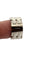 Bague 52 Bague Chanel Ultra or blanc et céramique 58 Facettes
