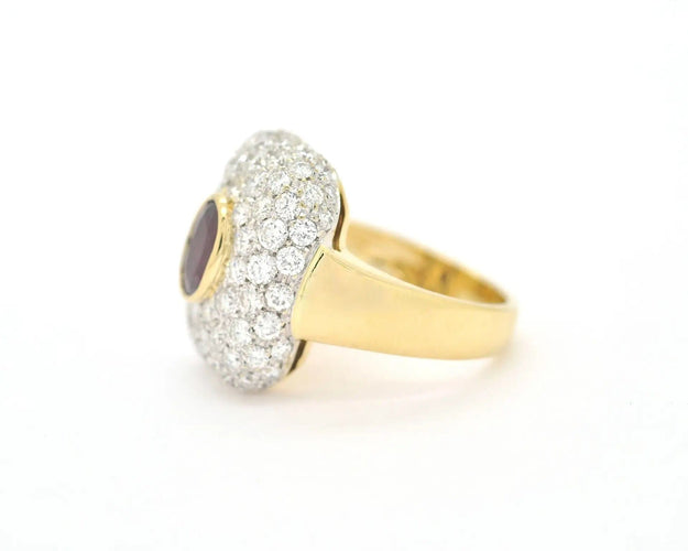 Bague Bague en or jaune avec un rubis de 1,35 ct et des diamants tout autour 58 Facettes 12501