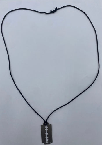 Pendentif Dinh Van - Pendentif "Lame de rasoir" GM sur cordon 58 Facettes 096424105792