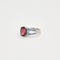 Bague Bague en or blanc ornée d'un Grenat Rhodolite et de saphirs 58 Facettes