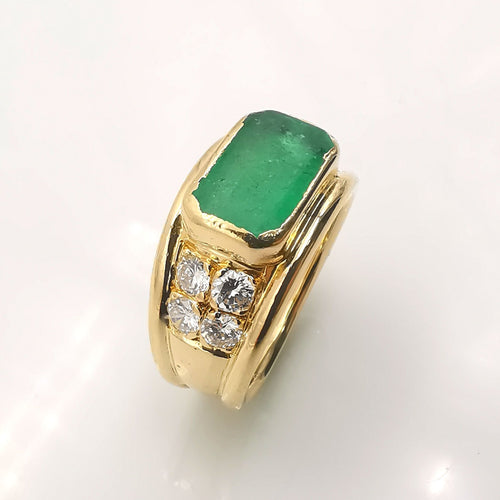 Bague 58 Bague en or jaune, émeraude et diamants 58 Facettes