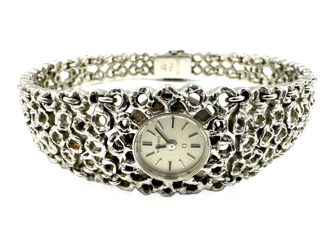 Montre GILBERT ALBERT/OMEGA - Montre de dame vintage en or blanc 58 Facettes