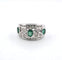 Bague Bague en or blanc des années 1970 avec émeraudes et diamants 58 Facettes