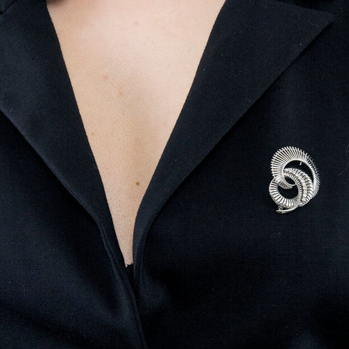 Broche Broche volutes platine et or blanc 58 Facettes GULK223