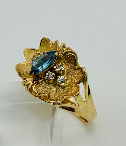 Bague 57 Bague vintage en or jaune avec aigue-marine marquise et diamants 58 Facettes 50300