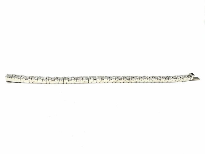 Bracelet CANTURI. Bracelet or balnc 18K et diamants baguettes. 58 Facettes