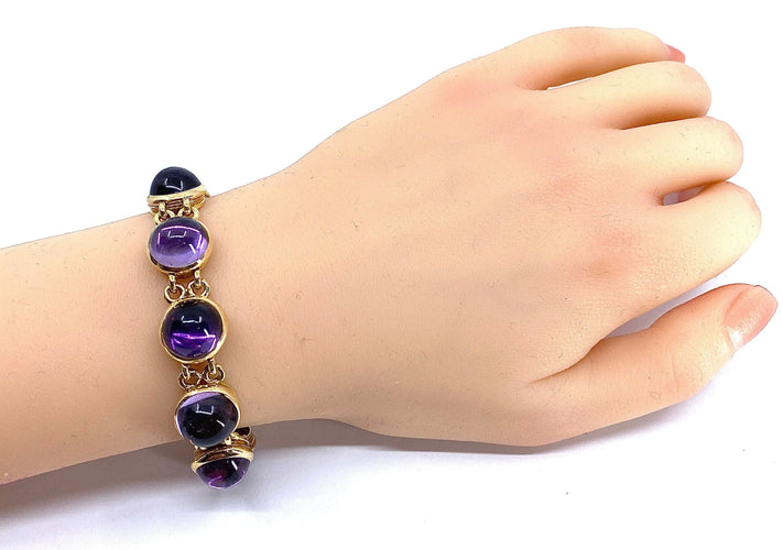 Bracelet Bracelet en or 18 carats sertie de 9 améthystes en cabochon 58 Facettes AB88
