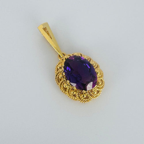 Pendentif Pendentif en or jaune avec améthyste ovale 58 Facettes 2509002