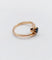 Bague 48 Bague tourbillon or jaune ornée d'un saphir (circa 1920) 58 Facettes A05082