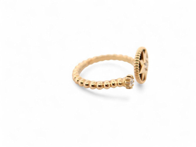 Bague 55 bague DIOR rose des vents t55 or jaune 18k diamants 0.10ct onyx 58 Facettes 271385