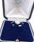 Bague 54 Bague en or blanc avec un diamant ovale au centre et des diamants brillants tout autour. 58 Facettes