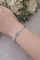 Bracelet Bracelet en or blanc à maillons rectangulaires, diamants et émeraudes 58 Facettes 50399