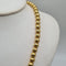 Collier Collier boules or jaune 18 carats 58 Facettes