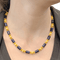Collier Collier Lalaounis, or jaune, sodalites. 58 Facettes 34619