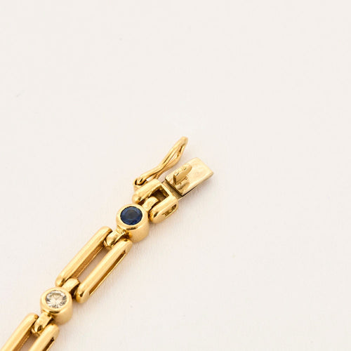 Bracelet Bracelet en or jaune, diamants et saphirs 58 Facettes LP1236/17