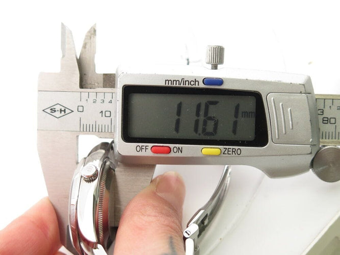 Montre montre ROLEX 15210 oyster perpetual date 34 mm acier automatique 58 Facettes 266340