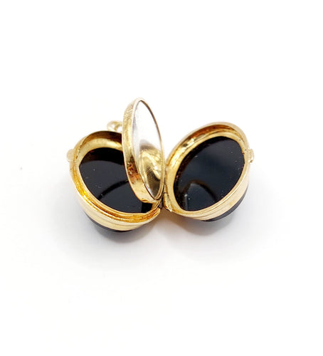 Pendentif Pendentif porte-photo or jaune et onyx (circa 1900) 58 Facettes A05916