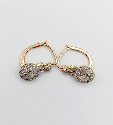 Boucles d'oreilles Dormeuses marguerite - Boucles d’oreilles en or 18k, platine et diamants 58 Facettes A06632
