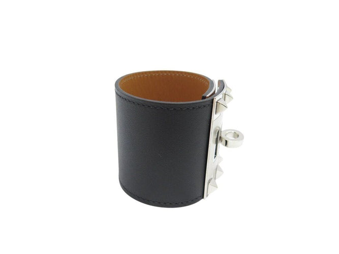 Bracelet bracelet HERMES extreme kelly dog manchette en cuir noir 50mm 58 Facettes 267199