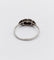 Bague 56 Bague Art Déco or blanc, diamant et monture géométrique (circa 1920) 58 Facettes A06246