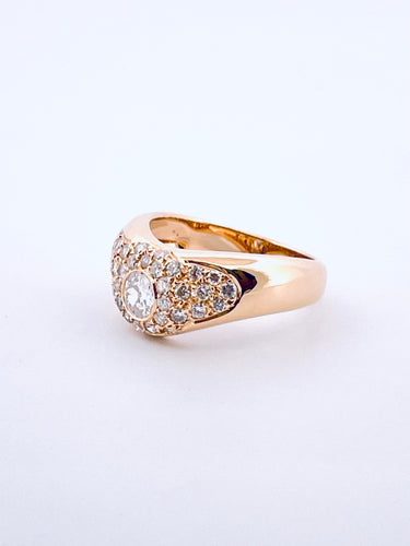 Bague 56 Bague ondulée en or jaune, diamants 58 Facettes