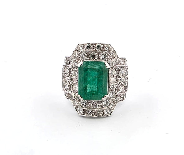 Bague 55 Bague en or blanc avec émeraude et diamants 58 Facettes