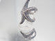 Bague 52 Bague étoile de mer or blanc 18 carats saphirs et diamants 58 Facettes