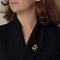 Broche Van Cleef & Arpels  Rare Broche animalière à décor d'Ecureuil en platine et or jaune, diamants, rubis et cabochon de turquoise. 58 Facettes HOU5762