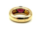Bague 51 CARTIER. Collection "Ellipse", bague or jaune et grenat 58 Facettes