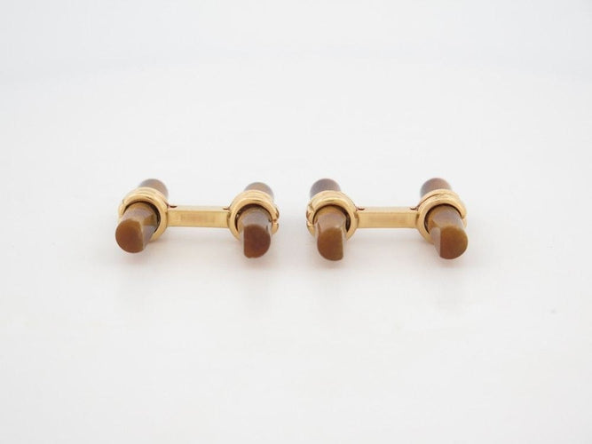 Boutons de manchette boutons de manchettes BOUCHERON en or 19 batonnets faisceaux 58 Facettes 260635
