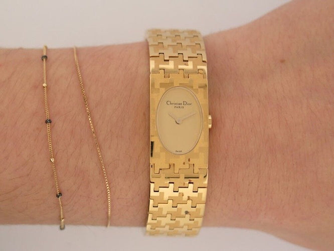Montre montre miss dior 23 mm plaque or jaune quartz 58 Facettes 258790