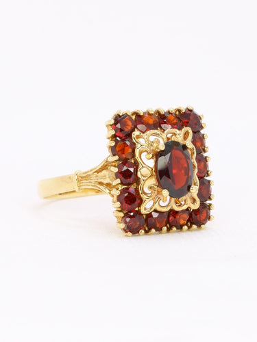 Bague vintage or jaune grenats