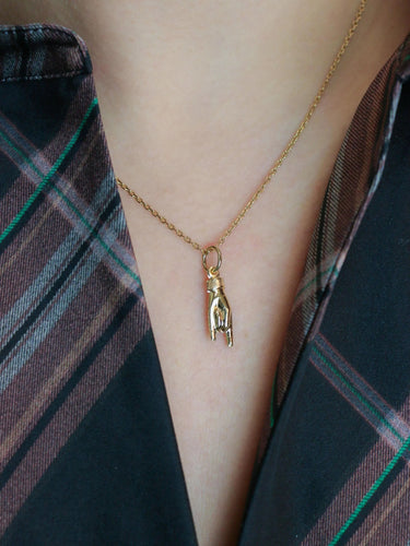 Pendentif Pendentif Charms main signe des cornes or jaune 58 Facettes 1099.17