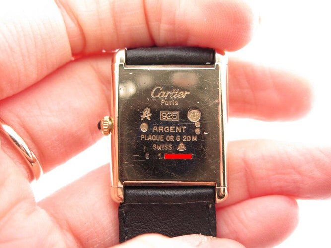 Montre vintage montre must de CARTIER tank 30 mm mecanique vermeil dore en 58 Facettes 266183
