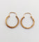 Boucles d'oreilles Créoles style Art Déco or rose finement travaillées (circa 1970) 58 Facettes A06262