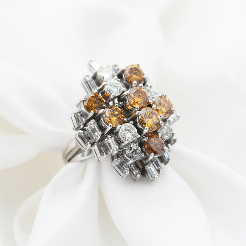 Bague Bague en or blanc avec diamants jaunes et blancs 58 Facettes