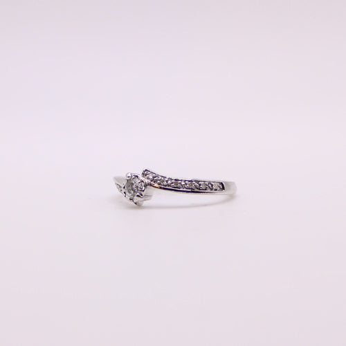 Bague Solitaire diamants et or blanc serti couteau et pavage sur le corps 58 Facettes