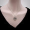 Collier Collier en platine, style édouardien, orné d'une croix de Malte et de diamants, avec une perle noire centrale. 58 Facettes A2001Z