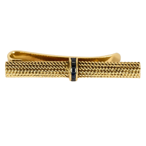 Broche Tiffany & Co.Epingle à cravatte en or jaune et saphir calibrés. 58 Facettes COL3287