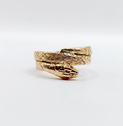 Bague 54.5 Bague serpent or rose finement tressée yeux rubis 58 Facettes A04370
